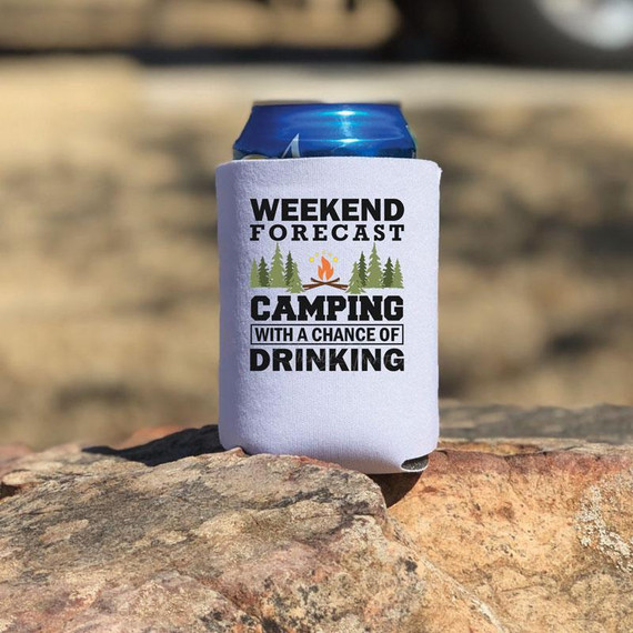Weekend Forecast Drinking Can Hugger Screen Print Heat Transfer, a white can cooler with humorous camping and drinking quote displayed outdoors on a rock.