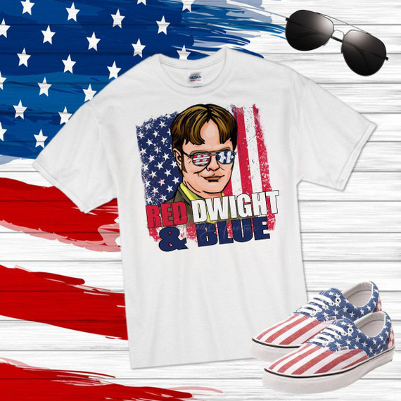 Red Dwight and Blue The Office patriotic fan art sublimation transfer, featuring a graphic of a character with American flag sunglasses and a background of the American flag, on a white T-shirt, with American flag themed sneakers and sunglasses around.
