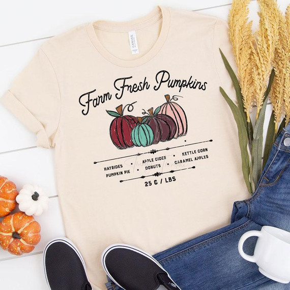 Farm Fresh Pumpkins Screen Print Heat Transfer - 1655983952, a cream-colored T-shirt with a colorful pumpkin design and farm-themed text.
