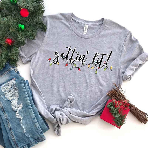Gettin' Lit Screen Print Heat Transfer, gray T-shirt with Christmas light string graphic and text, holiday fashion apparel.