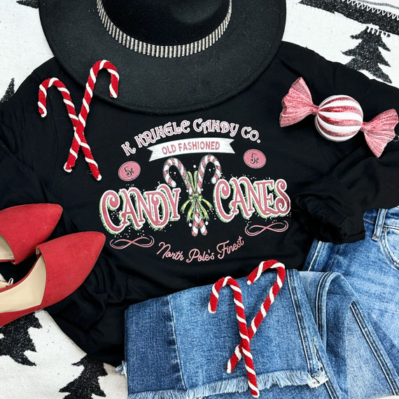 Old Fashioned Candy Canes Screen Print Heat Transfer on a black T-shirt with festive candy cane graphics and holiday text.