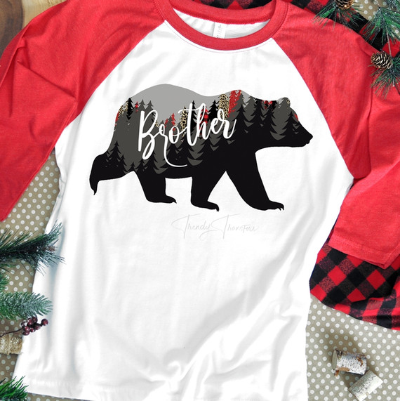 Brother Bear Screen Print Heat Transfer, bear silhouette with forest and mountain design and the word Brother written inside of the bear.