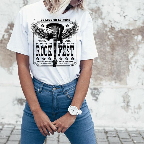 Rock Fest Sublimation Transfer, a black and white graphic design featuring a guitar with wings and the text 'Go Loud or Go Home' and 'Rock Fest' on a white T-shirt worn by a person standing outdoors.