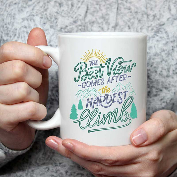 The Best View Comes After The Hardest Climb sublimation transfer mug, white ceramic mug with motivational mountain and forest design.