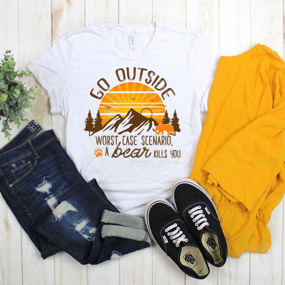 Go Outside Worse Case Scenario a Bear Kills You Sublimation Transfer t-shirt, white shirt with mountain and sunset design, featuring text and bear illustration.