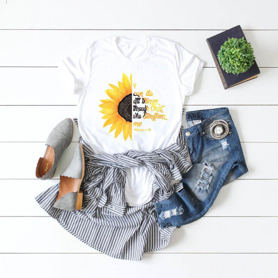 I Can Do All Things Through Christ Sunflower Sublimation Transfer T-shirt, white t-shirt with sunflower design and biblical quote for inspirational Christian apparel.