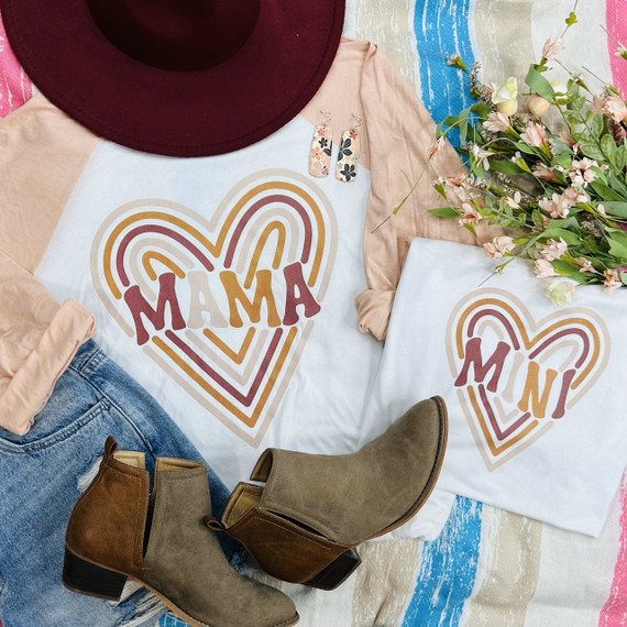 Mama Retro Heart Screen Print Heat Transfer, flat lay of clothing and accessories with a heart design and the word 'Mama' on a white T-shirt.