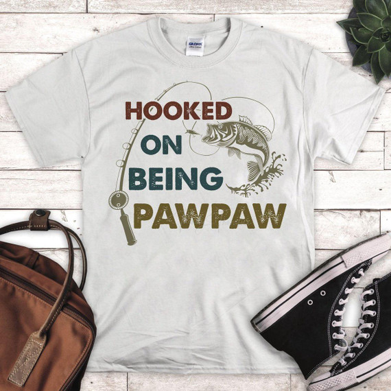 Hooked On Being PawPaw Fishing Sublimation Transfer, t-shirt with fishing-themed design and slogan.