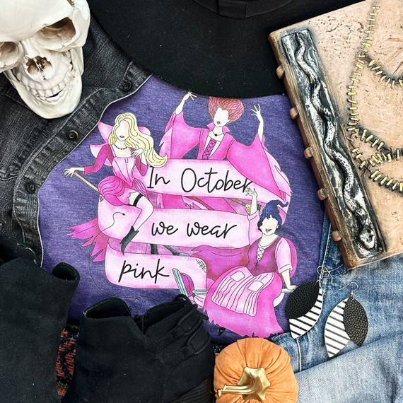 In October We Wear Pink Screen Print Heat Transfer, pink-themed illustration of women with banner and Halloween decorations.