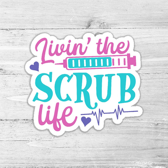 Livin' The Scrub Life Die Cut Sticker, colorful vinyl sticker with medical-themed text and icons on a wooden background.