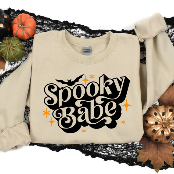 Spooky Babe DTF Transfer, Halloween-themed sweatshirt with bat and star graphics in black and orange.