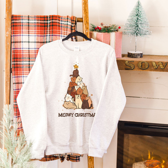 Meowy Christmas DTF Transfer, Christmas-themed sweatshirt featuring a design of various cartoon cats forming a Christmas tree