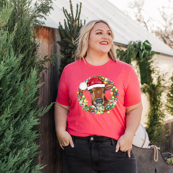 Christmas Cow Wreath DTF Transfer, festive holiday design featuring a cow wearing a Santa hat surrounded by a colorful Christmas wreath.