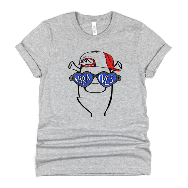 Braves Mascot DTF Heat Transfer, gray t-shirt with cartoon mascot wearing sunglasses with 'BRAVES' written on the lenses and a red cap, casual sportswear design.