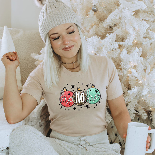 Ho Ho Ho Bulbs DTF Heat Transfer, Christmas holiday themed T-shirt with colorful ornament design.