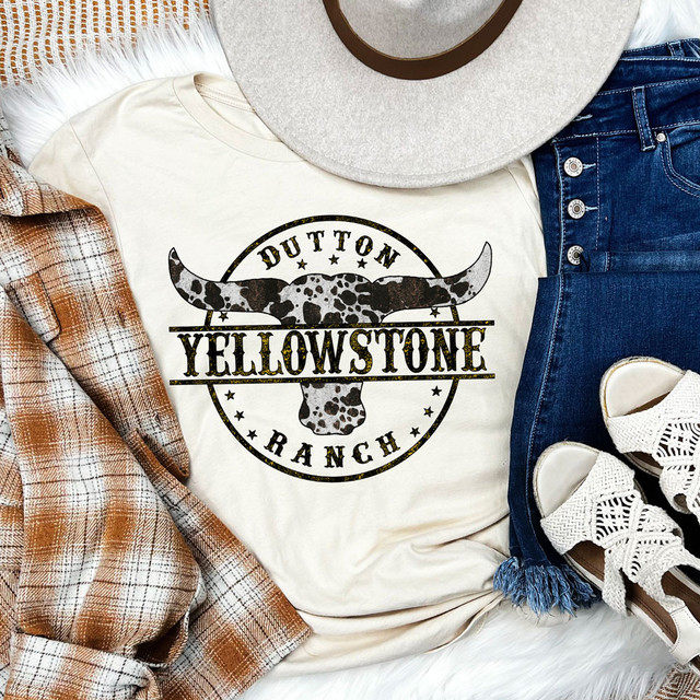 Dutton Ranch Cowhide DTF Heat Transfer, cowboy hat, denim jeans, plaid shirt, white sneakers, and T-shirt with Yellowstone-themed cowhide buffalo graphic.