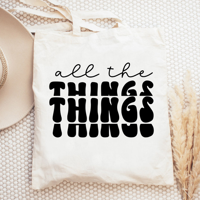 All The Things DTF Heat Transfer, white tote bag with bold black and script text design.