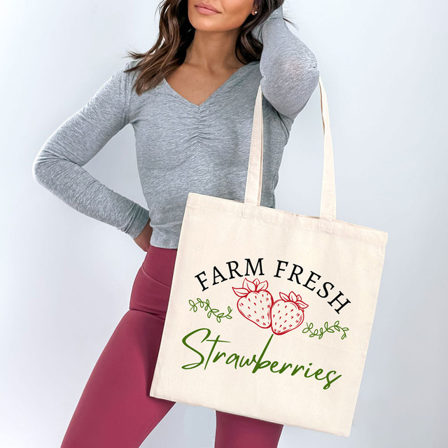 Farm Fresh Strawberries DTF Heat Transfer, tote bag with strawberries graphic and text design.