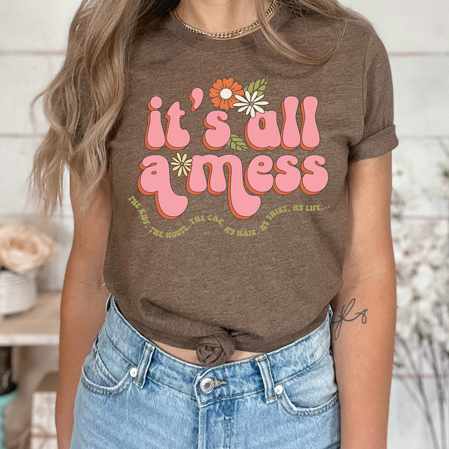 It's All A Mess Floral DTF Heat Transfer, brown t-shirt with a colorful floral design and playful text for casual wear.