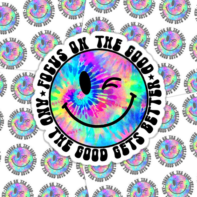 Focus On The Good And The Good Gets Better Sticker Sheet, rainbow tie-dye smiley face sticker with the motivational quote encircling it.