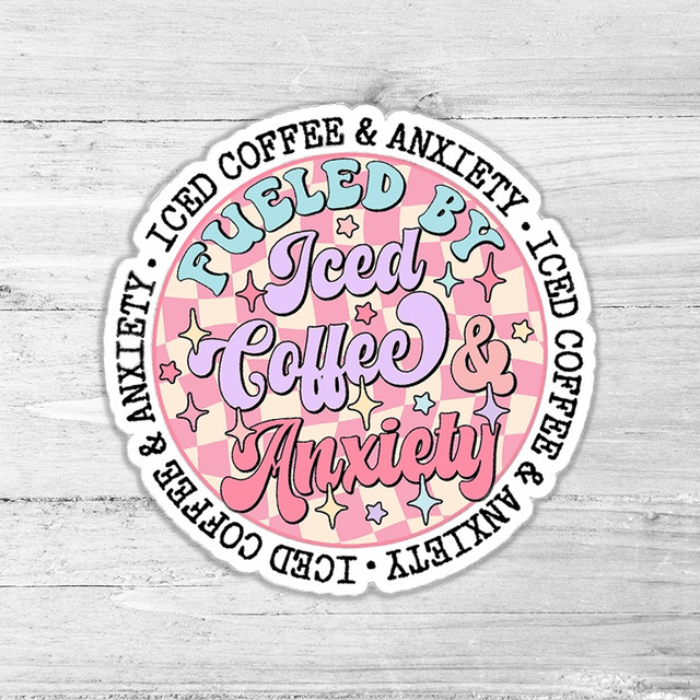 Fueled By Iced Coffee And Anxiety Die Cut Sticker, colorful round sticker with pastel pink and purple design, featuring text and stars, expressing a humorous mood about coffee and anxiety.
