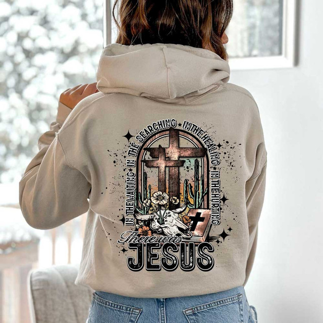 There Was Jesus DTF Heat Transfer, illustrated religious graphic with cross, flowers, bible, and praying hands design on a person's hoodie.