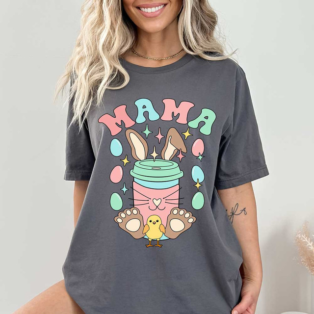 Mama Easter Drink DTF Heat Transfer, colorful spring-themed design with a cute bunny, coffee cup, Easter eggs, and a chick on a gray t-shirt.