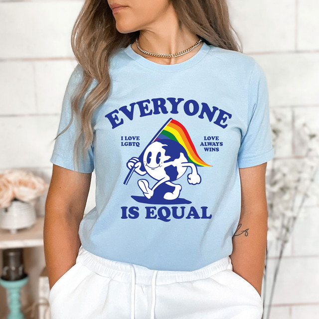 Everyone Is Equal DTF Heat Transfer, t-shirt with rainbow flag and cartoon character promoting equality and LGBTQ+ love