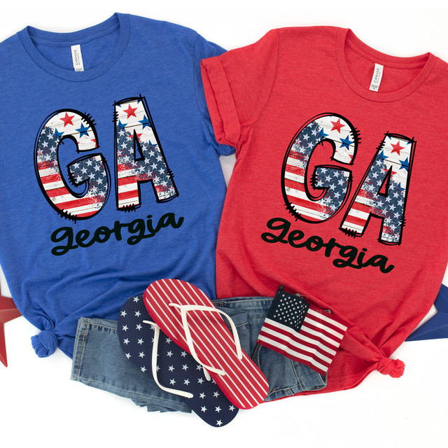 GA Stars & Stripes DTF Heat Transfer, patriotic USA-themed T-shirts with American flag design and text 'GA Georgia' in red and blue colors.