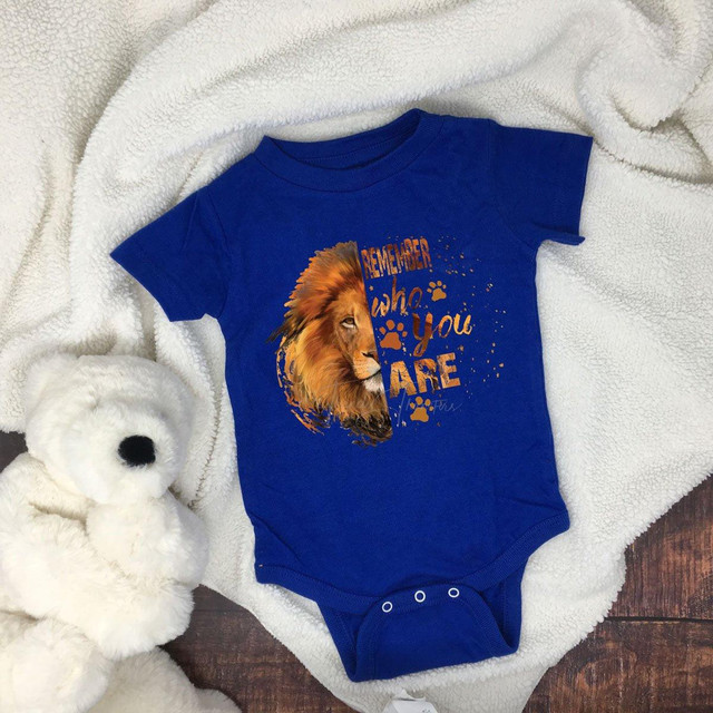 Lion Remember Who You Are FINAL STOCK - INFANT Screen Print Heat Transfer, blue baby onesie featuring a lion graphic and inspirational quote.