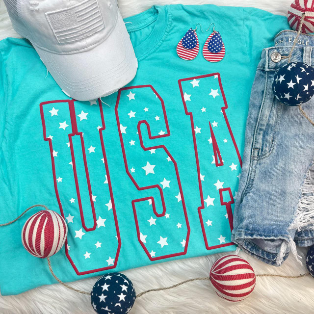 USA Stars PUFF Screen Print Heat Transfer, American flag-themed star pattern on turquoise fabric with patriotic accessories