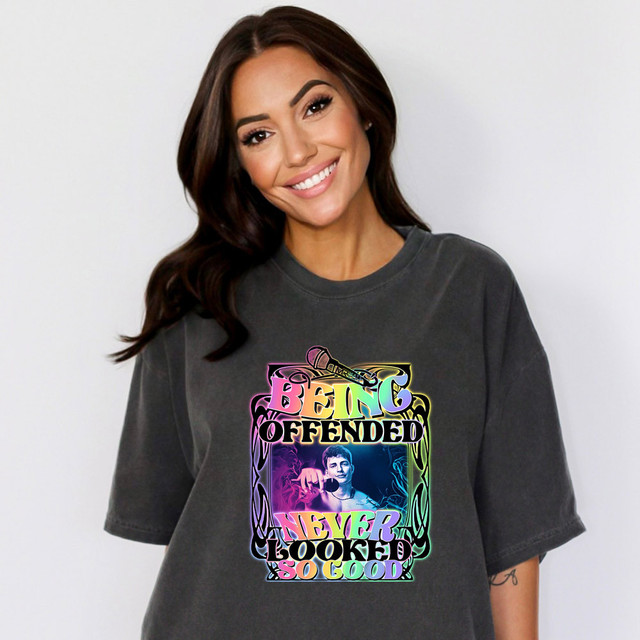 Being Offended Never Looked So Good DTF Heat Transfer, colorful graphic T-shirt worn by a smiling woman.