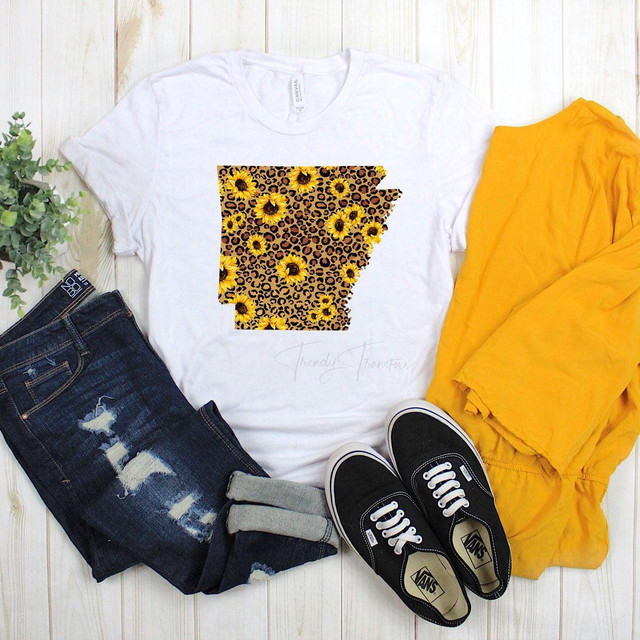 Arkansas Leopard and Sunflower Sublimation Transfer, colorful graphic T-shirt with Arkansas map design featuring sunflower and leopard print pattern.
