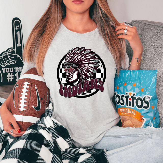Indians Mascot Glitter Effect DTF Heat Transfer, featuring a sports mascot design with a glittery effect on a grey t-shirt worn by a woman.
