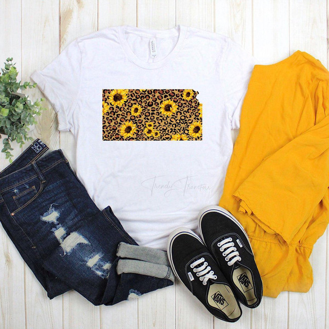 Kansas Leopard and Sunflower Sublimation Transfer, graphic design featuring a leopard pattern with yellow sunflowers, displayed on a white T-shirt.
