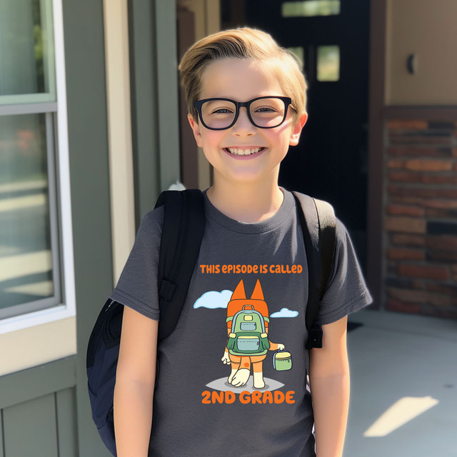 This Episode is Called 2nd Grade GREEN DTF Heat Transfer, a graphic design featuring a cartoon fox with a backpack and lunchbox, suitable for school-themed apparel.