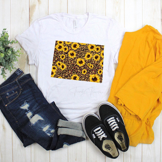 Colorado Leopard Sunflower Sublimation Transfer, a vibrant sunflower and leopard print design on a white t-shirt.