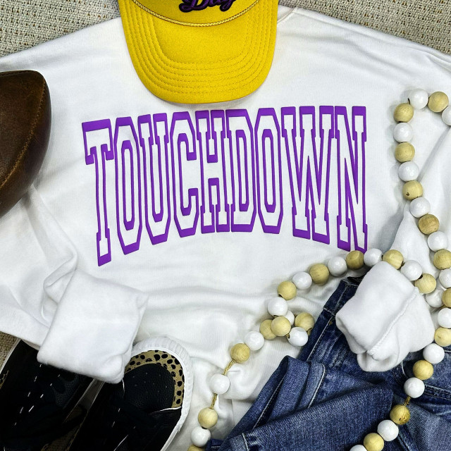 Touchdown Purple PUFF Screen Print Heat Transfer, purple puff screen print text on a white t-shirt with yellow cap, jeans, and accessories.