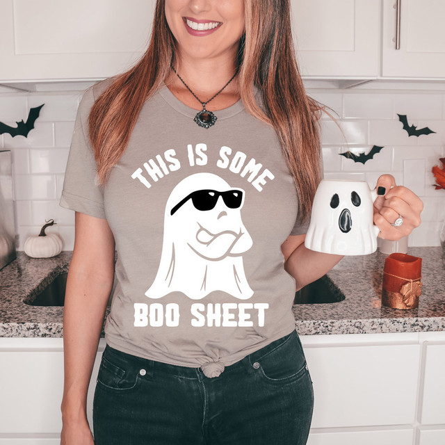 This Is Some Boo Sheet DTF Heat Transfer, a humorous ghost graphic with sunglasses on a woman's gray t-shirt.