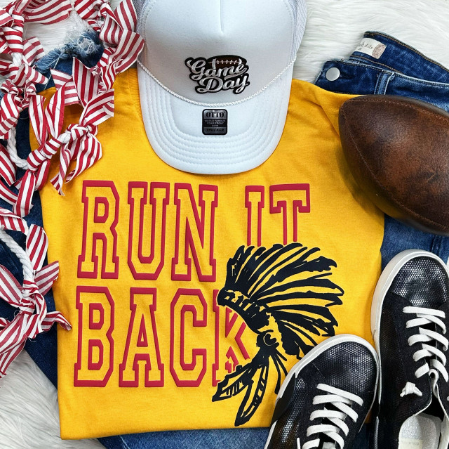 Run It Back Red PUFF Screen Print Heat Transfer, yellow T-shirt with red and black graphic design and text, paired with white cap, striped scarf, jeans, sneakers, and football.