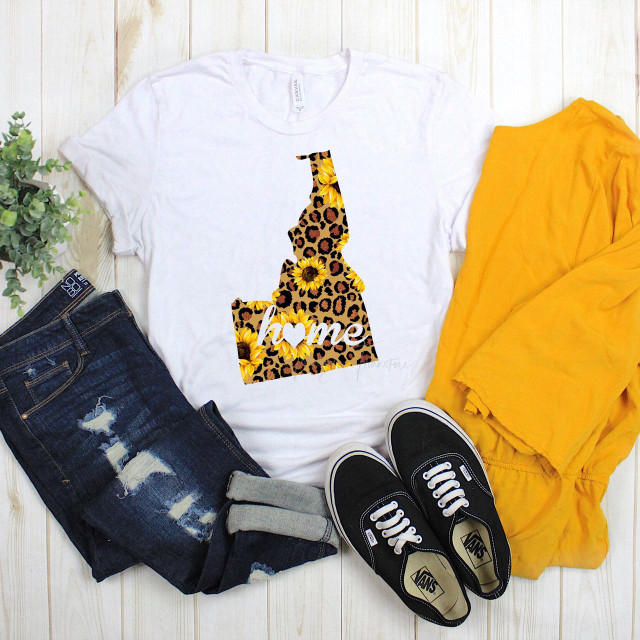 Idaho Leopard Sunflower home Sublimation Transfer, white T-shirt with a colorful leopard and sunflower design with the word 'home' printed on it.