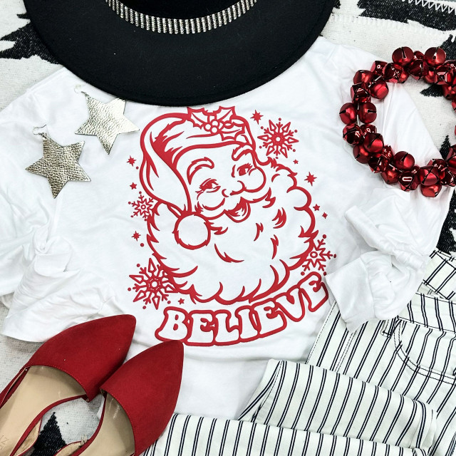 Believe RED PUFF Screen Print Heat Transfer, red Christmas-themed graphic of Santa Claus with the word 'BELIEVE' on white fabric.