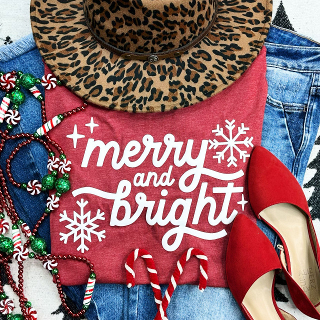 White Puff Merry & Bright Screen Print Heat Transfer, Christmas holiday home decor with red sweatshirt, Christmas beads, red shoes, and a leopard print hat.
