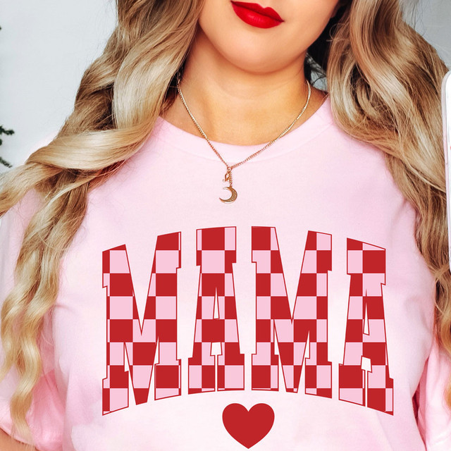 Mama Valentine Checkered DTF Heat Transfer, checkered red and pink plaid heart design on a pink t-shirt worn by a woman with blonde hair and red lipstick.