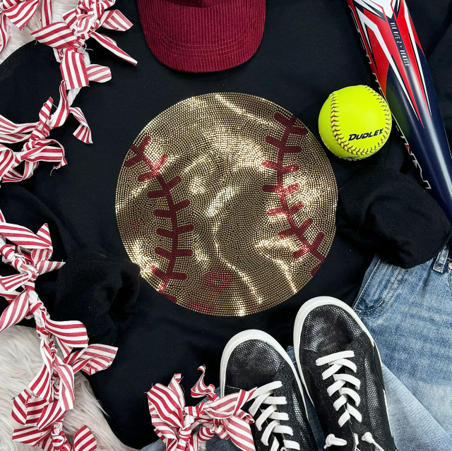 Spangled SOFTBALL Transfer, glittering gold softball design on black fabric with red stitching detail.