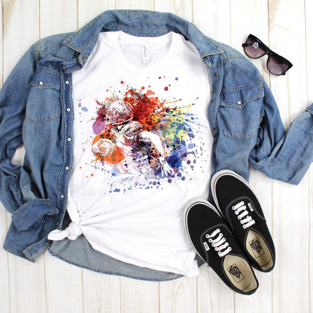 Watercolor splash football player sublimation transfer, printed on a t-shirt with a denim jacket, sneakers, and sunglasses.