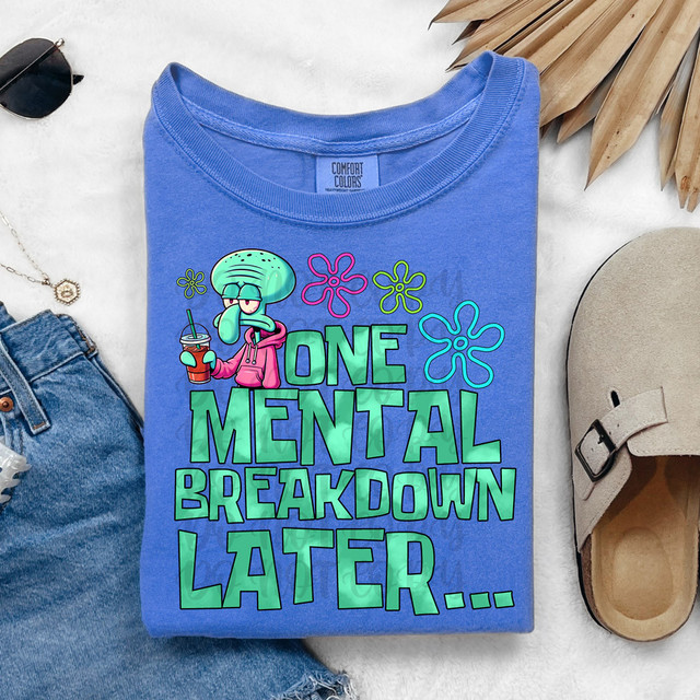 One Mental Breakdown Later... DTF Heat Transfer, blue t-shirt with cartoon octopus character wearing pink hoodie holding a drink, and colorful flower designs.