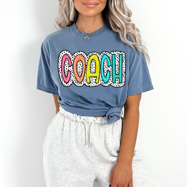 Coach Dalmatian Dots DTF Heat Transfer, colorful and playful polka dot design on a blue t-shirt.