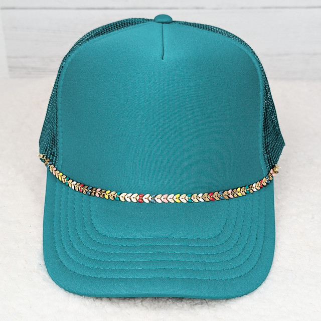 Colorful Chevron Gold Hat Chain, vibrant gold hat chain with colorful chevron design draped across front of a teal cap.