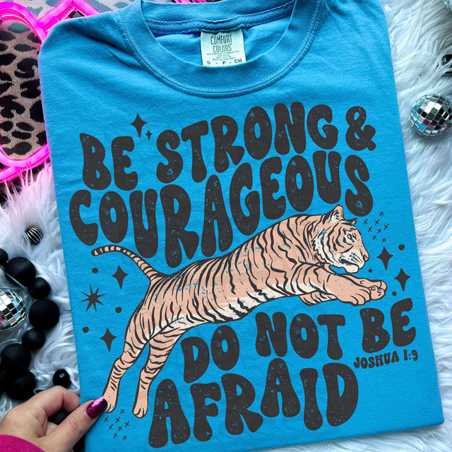 Be Strong & Courageous Do Not Be Afraid DTF Heat Transfer T-Shirt with a tiger graphic and inspirational quote from Joshua 1:9.